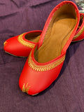 Red & Gold Embroidered Punjabi Jutti – Handcrafted Ethnic Footwear with Elegant Zari Detailing for Weddings & Festive Wear